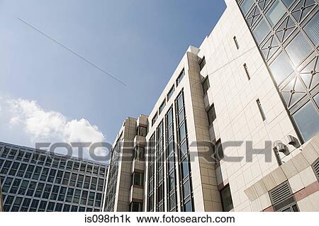 Low angle view of office buildings View Large Photo Image Stock Image - Low angle view of office buildings. Fotosearch