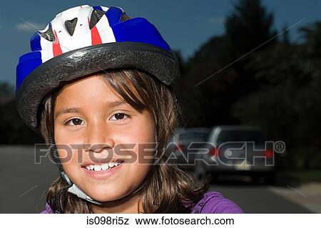 Girl wearing bicycle helmet View Large Photo Image Stock Photo - Girl wearing bicycle helmet. Fotosearch
