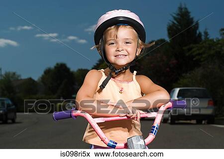 Girl with bicycle View Large Photo Image Stock Photo - Girl with bicycle. Fotosearch