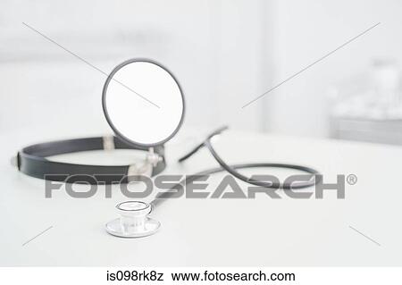 Stethoscope and head mirror View Large Photo Image Stock Photo - Stethoscope and head mirror. Fotosearch