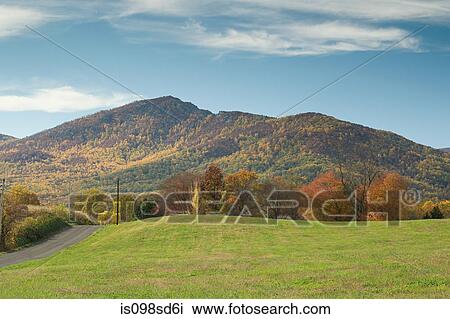 A road leading towards a mountain range View Large Photo Image Stock Image - A road leading towards a mountain range. Fotosearch