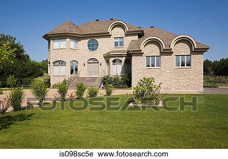 Stock Image - Large house and garden. Fotosearch