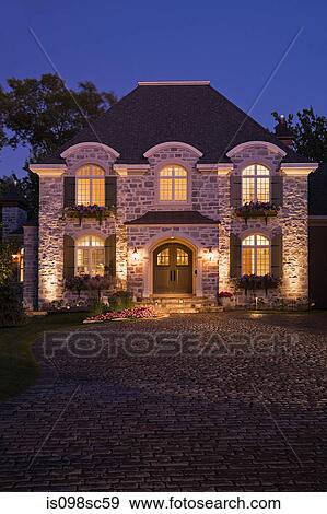 Large house illuminated View Large Photo Image Stock Photo - Large house illuminated. Fotosearch