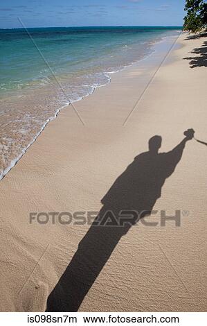 Shadow on the beach. View Large Photo Image Picture - Shadow on the beach.. Fotosearch
