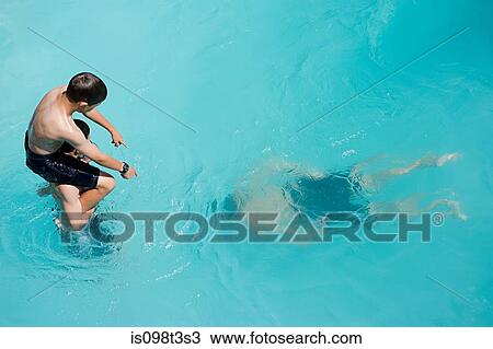 Boys playing in swimming pool, Auckland View Large Photo Image Stock Image - Boys playing in swimming pool, Auckland. Fotosearch