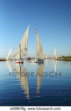 Felucca boats on river nile at luxor View Large Photo Image Stock Image - Felucca boats on river nile at luxor. Fotosearch
