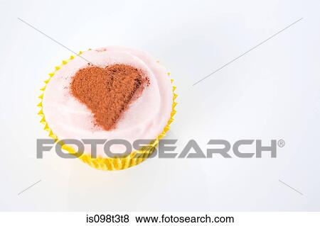 Stock Photo - Heart shape on cupcake. Fotosearch