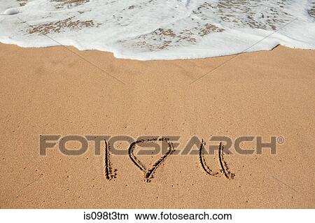 I love you written in sand View Large Photo Image Picture - I love you written in sand. Fotosearch