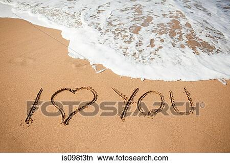 I love you written in sand View Large Photo Image Picture - I love you written in sand. Fotosearch
