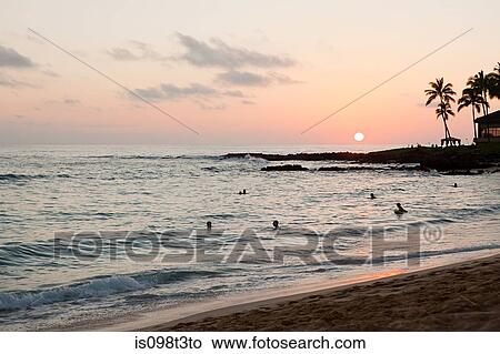 People in sea at sunset View Large Photo Image Picture - People in sea at sunset. Fotosearch