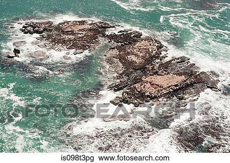 Rocks in the sea View Large Photo Image Stock Image - Rocks in the sea. Fotosearch