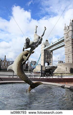 Stock Image - Statue and tower bridge london. Fotosearch