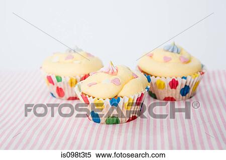 Three cupcakes View Large Photo Image Stock Photography - Three cupcakes. Fotosearch