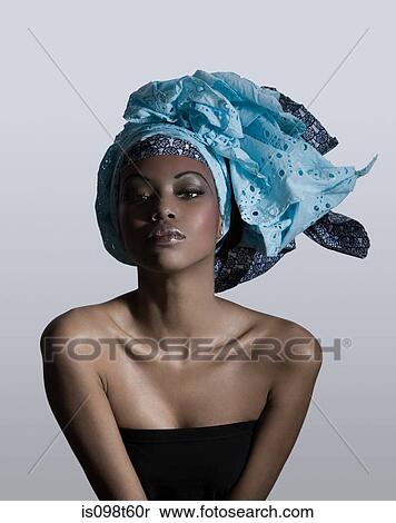 Stock Photography - Young woman wearing head tie. Fotosearch