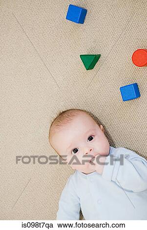Stock Image - Baby and building blocks. Fotosearch