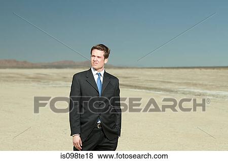 Businessman in desert View Large Photo Image Stock Photo - Businessman in desert. Fotosearch
