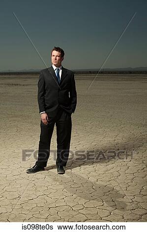 Businessman in desert View Large Photo Image Stock Photograph - Businessman in desert. Fotosearch