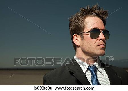 Businessman in sunglasses View Large Photo Image Stock Photograph - Businessman in sunglasses. Fotosearch