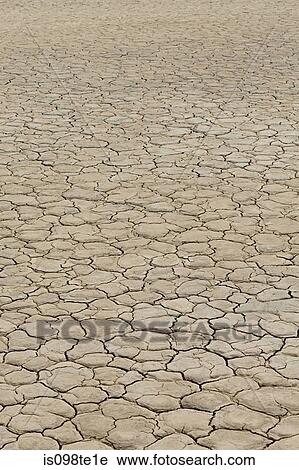 Cracked surface of dry lake bed View Large Photo Image Stock Image - Cracked surface of dry lake bed. Fotosearch
