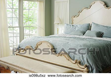 Bed in elegant bedroom View Large Photo Image Stock Photo - Bed in elegant bedroom. Fotosearch