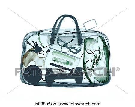 Stock Photo - Xray image of bag containing sports equipment. Fotosearch