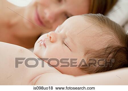 Baby girl sleeping View Large Photo Image Stock Photo - Baby girl sleeping. Fotosearch