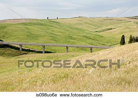 Bridge and rolling landscape, Val d'Orcia, Italy View Large Photo Image Stock Image - Bridge and rolling landscape, Val d'Orcia, Italy. Fotosearch