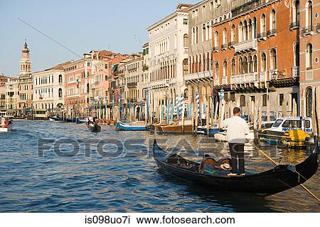 Stock Image - Gondolier on grand canal, Venice, Italy. Fotosearch