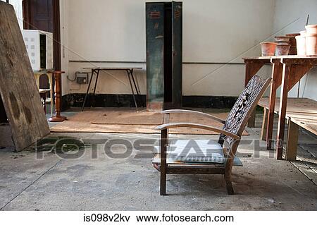 Stock Photo - Empty wooden chair indoors. Fotosearch