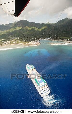 Stock Image - Aerial view from paraglider of cruise ship. Fotosearch