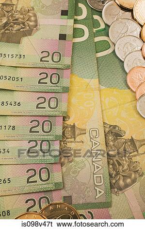 Canadian 20 dollar banknotes and coins View Large Photo Image Stock Photograph - Canadian 20 dollar banknotes and coins. Fotosearch