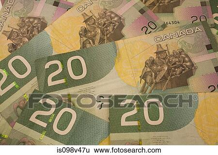 Canadian 20 dollar banknotes View Large Photo Image Stock Photograph - Canadian 20 dollar banknotes. Fotosearch