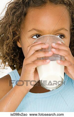 Girl drinking milk View Large Photo Image Picture - Girl drinking milk. Fotosearch
