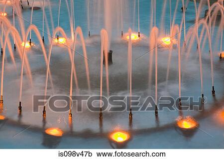 Stock Image - Illuminated water fountain, Old Montreal, Quebec, Canada. Fotosearch
