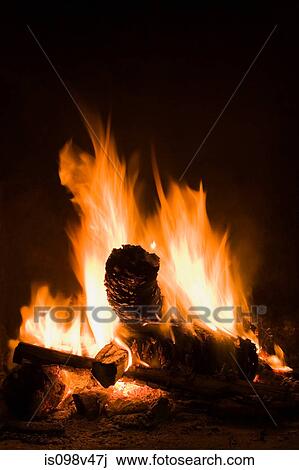 Logs burning in open fire View Large Photo Image Stock Image - Logs burning in open fire. Fotosearch