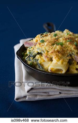 Stock Photo - Pasta dish cooked in skillet. Fotosearch