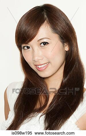 Portrait of brunette woman, studio shot View Large Photo Image Stock Photography - Portrait of brunette woman, studio shot. Fotosearch