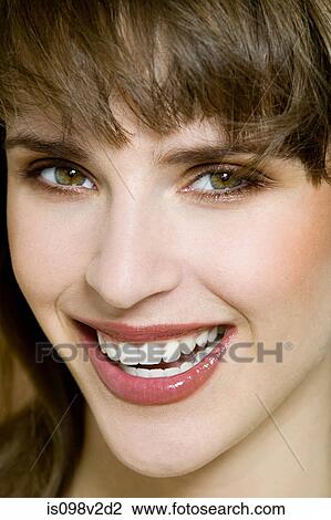 Stock Image - Portrait of young brunette woman. Fotosearch