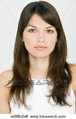 Stock Photo - Portrait of young brunette woman. Fotosearch