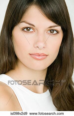 Stock Photo - Portrait of young brunette woman. Fotosearch