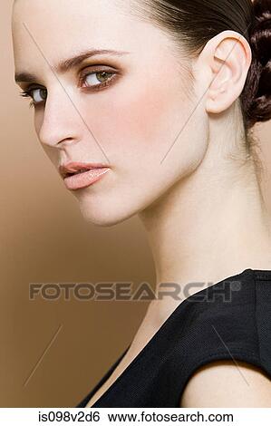 Portrait of young brunette woman View Large Photo Image Stock Photograph - Portrait of young brunette woman. Fotosearch