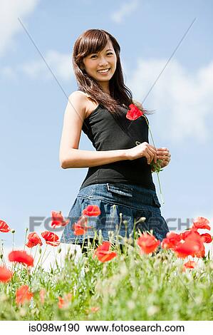 Woman in poppy field, Prague, Czech Republic View Large Photo Image Stock Image - Woman in poppy field, Prague, Czech Republic. Fotosearch