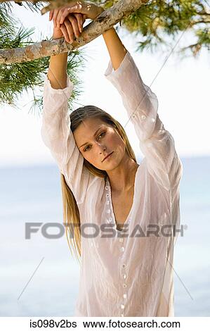 Young woman on vacation View Large Photo Image Stock Photograph - Young woman on vacation. Fotosearch