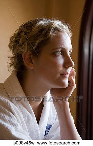 Young woman with hand on chin in health farm View Large Photo Image Stock Photo - Young woman with hand on chin in health farm. Fotosearch