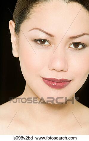 Young woman's face View Large Photo Image Stock Image - Young woman's face. Fotosearch