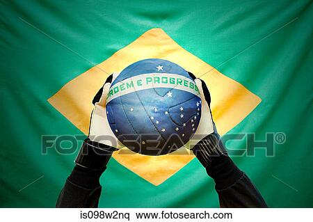Brazilian goalkeeper holding football View Large Photo Image Stock Photography - Brazilian goalkeeper holding football. Fotosearch