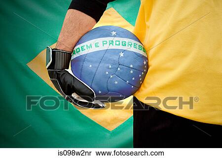 Brazilian goalkeeper holding football View Large Photo Image Stock Photography - Brazilian goalkeeper holding football. Fotosearch