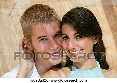 Close up of a young couple View Large Photo Image Picture - Close up of a young couple. Fotosearch