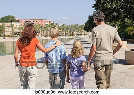 Stock Photography - Family walking together. Fotosearch