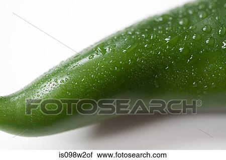 Stock Image - Green chilli pepper, close up. Fotosearch